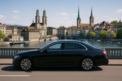 Luxury car with chauffeur service in Zurich city center highlighting premium transportation