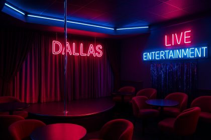 Colorful stage lights and vibrant interior of a Dallas strip club during live entertainment night