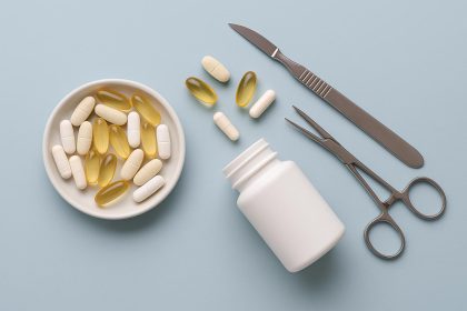 Bottles of pre-surgery supplements recommended by plastic surgeons on a clinic countertop