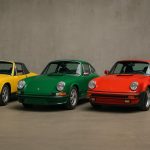 Classic 1970s Porsche models parked side by side, highlighting vintage sports car design