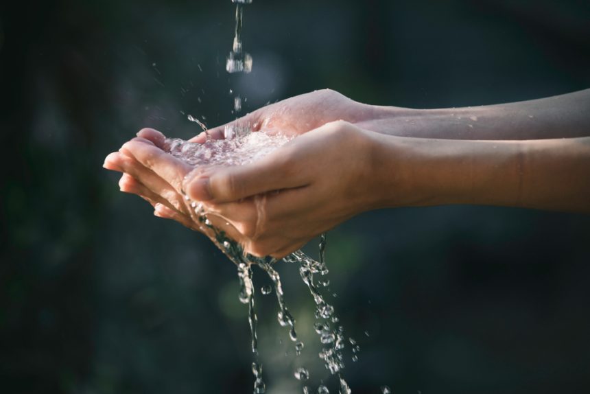 Closeup,Water,Flow,To,Hand,Of,Women,For,Nature,Concept