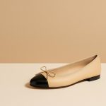 Iconic ballet flats showcased on a runway, highlighting classic and timeless fashion footwear