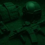 Advanced night vision goggles and tactical gear displayed on a table for night operations safety