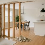 Spacious open concept living area showing seamless wall removal for modern home renovation