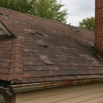 Damaged shingles and water leaks causing roof deterioration and need for replacement