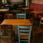 Misaligned restaurant tables and chairs highlighting poor floor planning in dining spaces