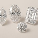 Elongated diamond shapes compared to round diamonds on a white background for size perception