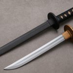Foam and wood replica katana swords side by side, showcasing cosplay weapon differences