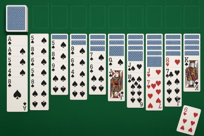 Spider Solitaire cards displayed on a digital screen with classic playing card layout and suits
