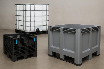 Bulk containers stacked in a warehouse for industrial storage and material handling solutions