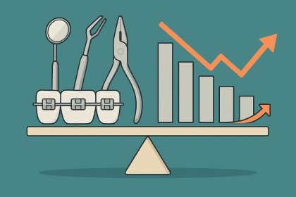 Orthodontist reviewing patient charts and business growth strategies in a modern dental office