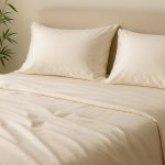 Soft luxury bamboo bed sheets neatly arranged on a modern bed in a stylish bedroom setting