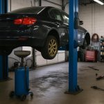 Mechanic performing car repair in Virginia Beach auto shop using professional tools and equipment