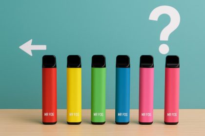 Assorted Mr Fog vape devices in various flavors and colors displayed on a sleek surface