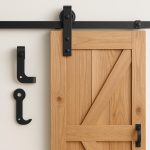 Stylish modern barn door with black metal hardware matching contemporary home interior décor