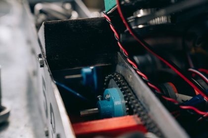Modern industrial machines with advanced noise reduction technology in a factory setting